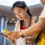 Apple Stores fill with customers trying out the iPhone 16