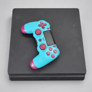 Used Sony PS4 Slim 500GB with turquoise and magenta controller on an AI-enhanced gray background; see original gallery photos.